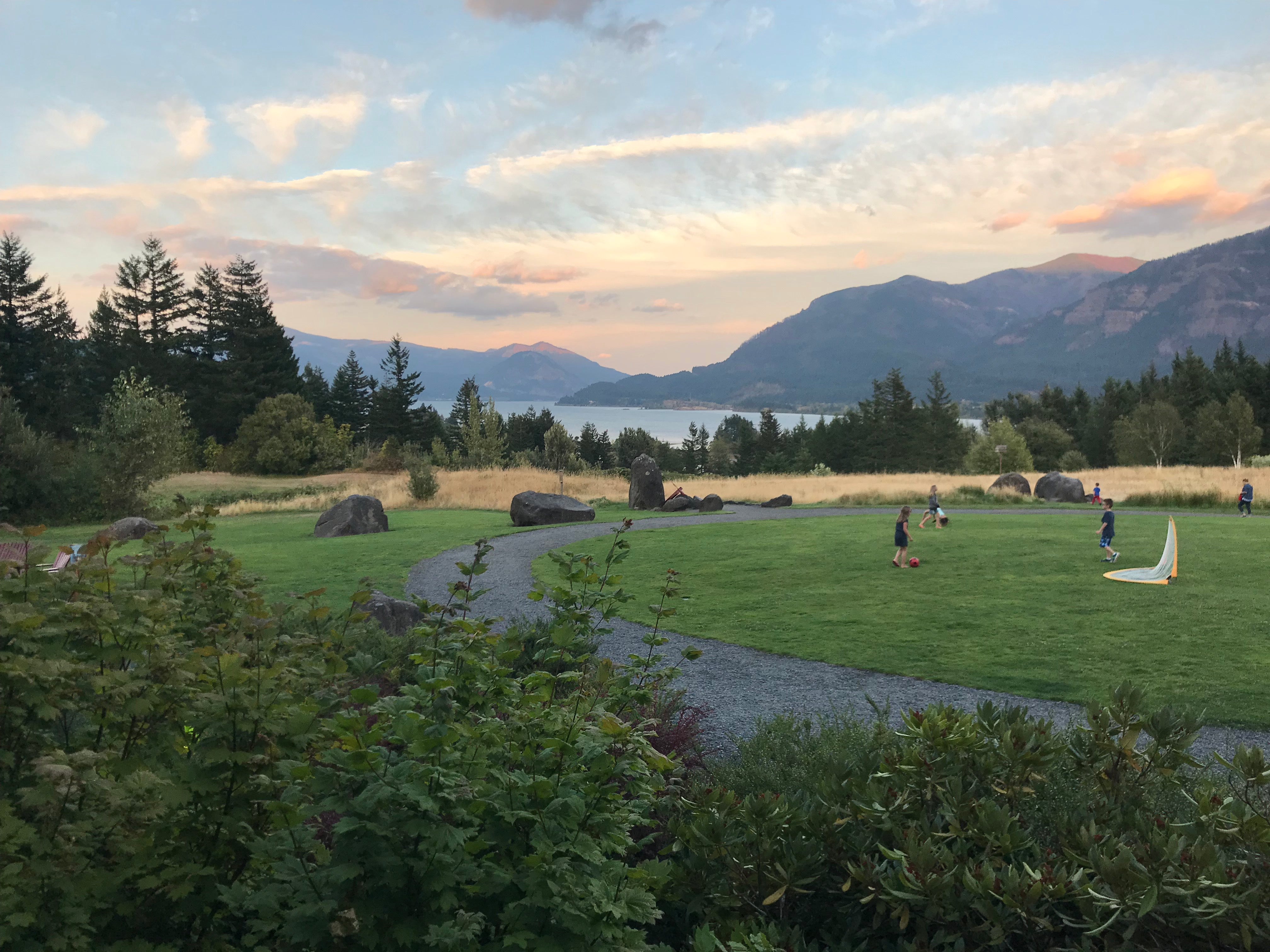 A field surrounded by mountains
