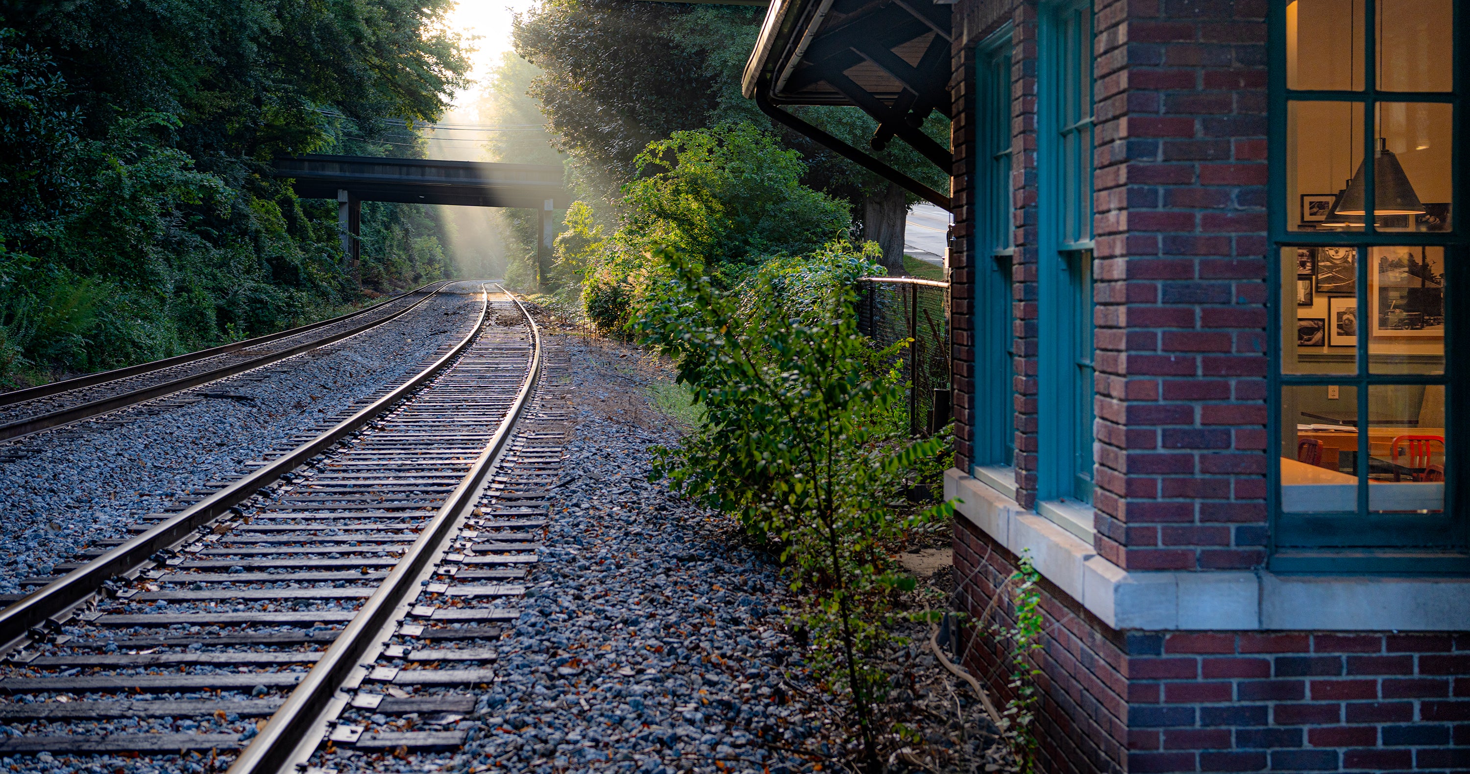 Outside of Kaldi's Coffee Depot cafe next to train tracks